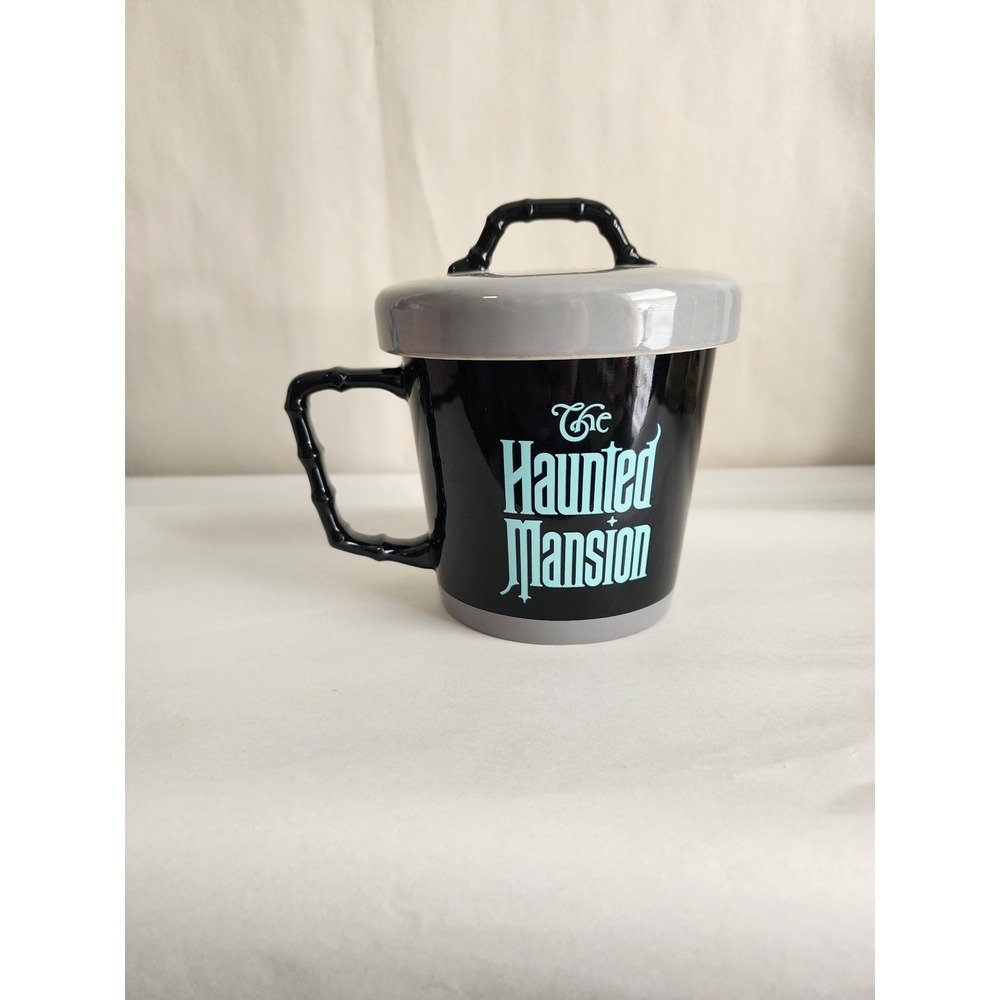 Disney Parks Haunted Mansion Stoneware Mug with Lid 21oz Black Teal Bone Handle